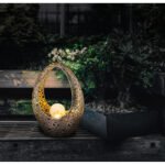 Lampă solară metal de culoare bronz aurie, sticlă crapata transparentă, IP44, sculptură  perforate decorative și bilă, LxLxH: 215x95x275mm, inclusiv LED 0,06W 3V, 3000K